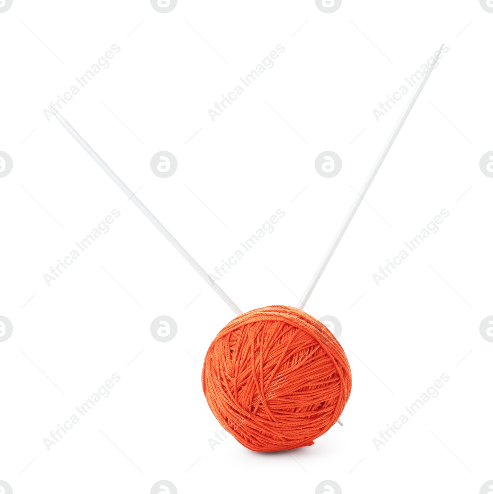 Photo of Ball of orange yarn and knitting needles isolated on white