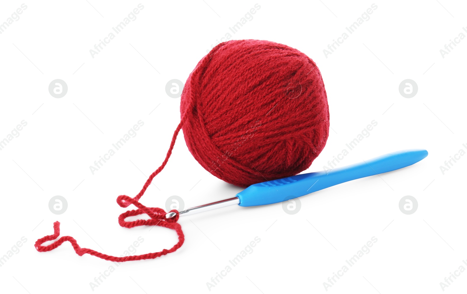 Photo of Ball of yarn and crochet hook isolated on white