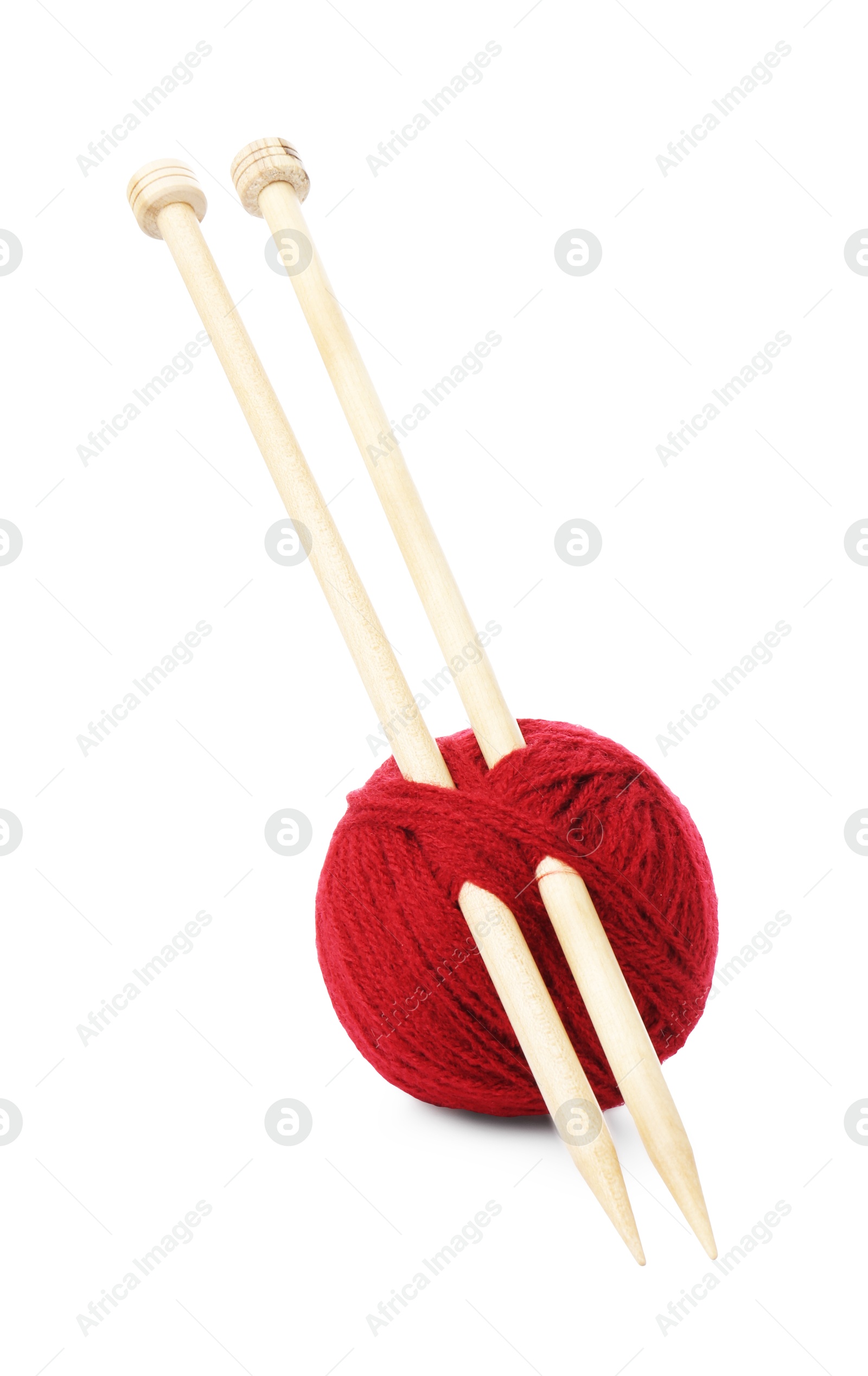 Photo of Ball of yarn and knitting needles isolated on white