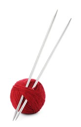 Photo of Ball of yarn and knitting needles isolated on white