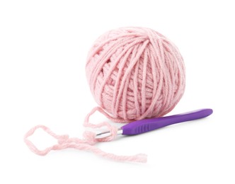 Photo of Ball of yarn and crochet hook isolated on white