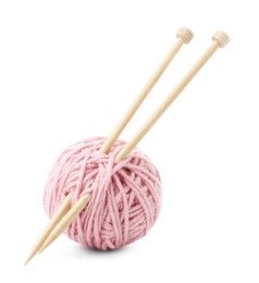 Ball of yarn and knitting needles isolated on white