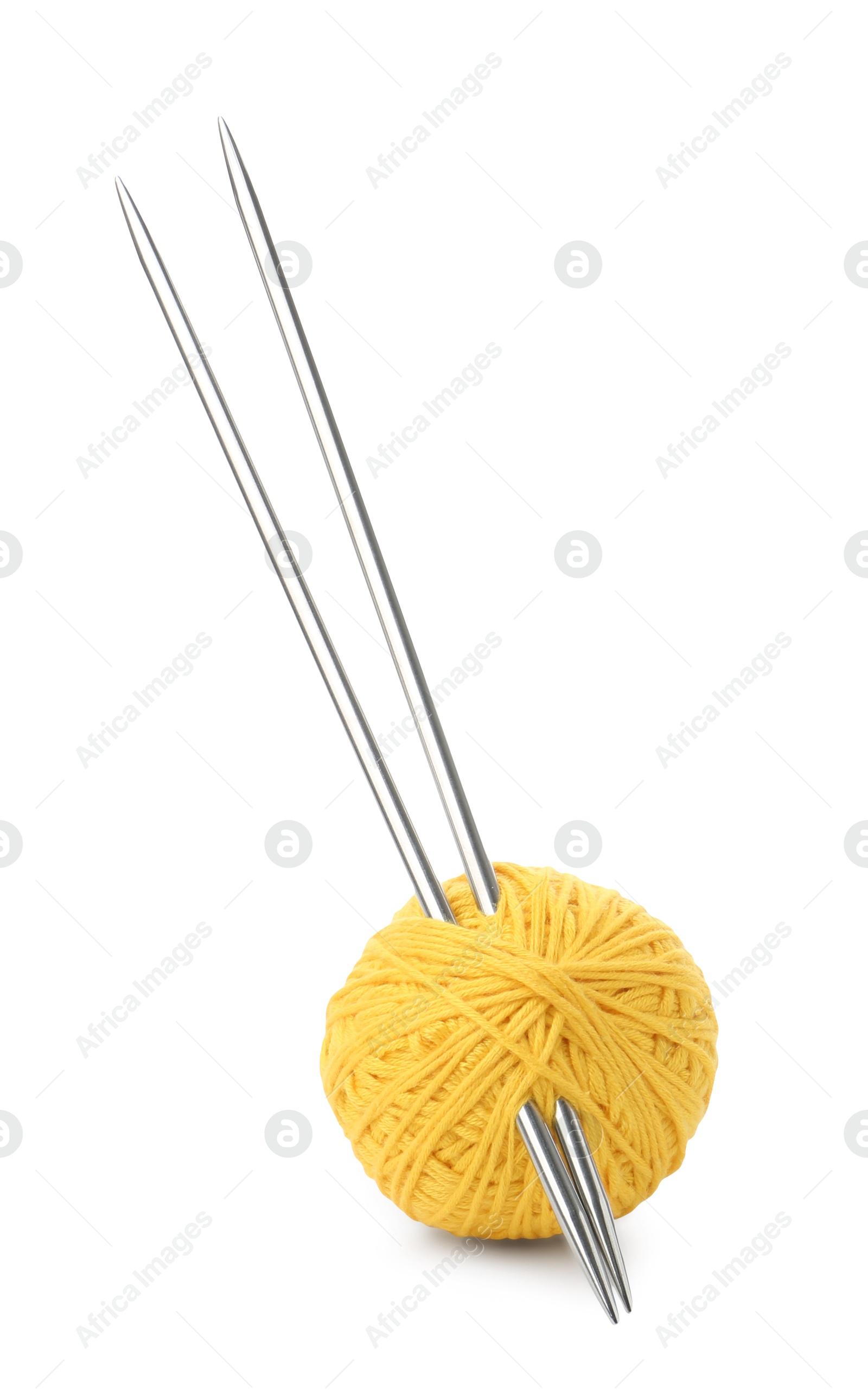 Photo of Ball of yellow yarn and knitting needles isolated on white