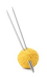 Photo of Ball of yellow yarn and knitting needles isolated on white