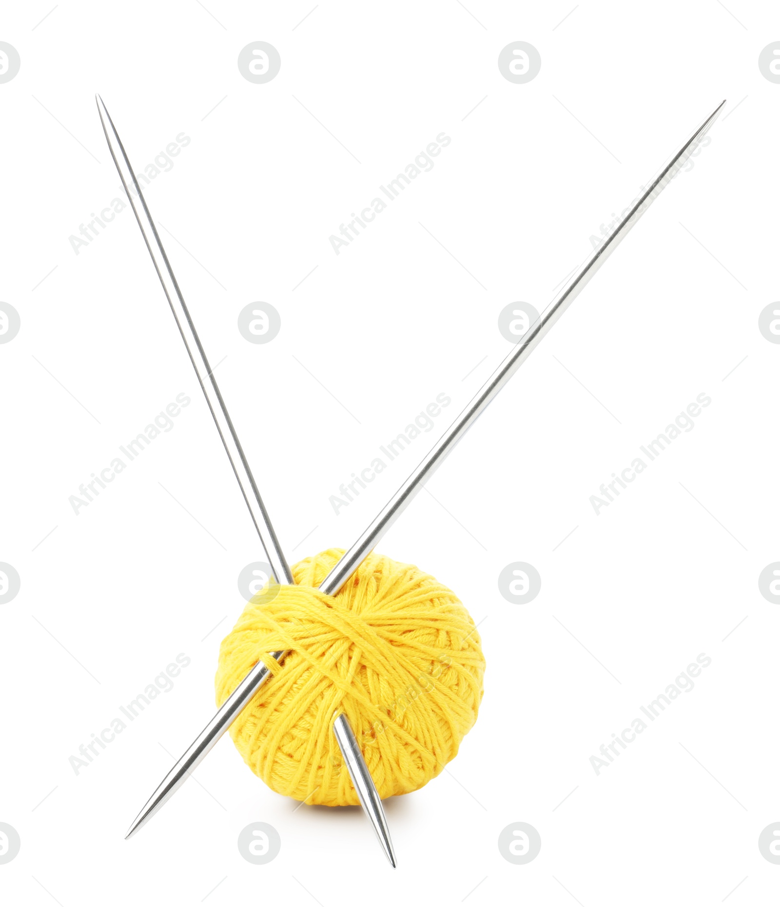 Ball of yellow yarn and knitting needles isolated on white Photo of Ball of yellow yarn and knitting needles isolated on white