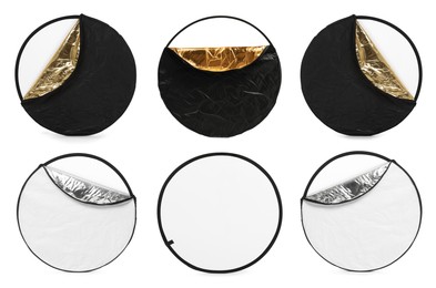 Image of Professional reflectors on white background, set. Photo studio equipment