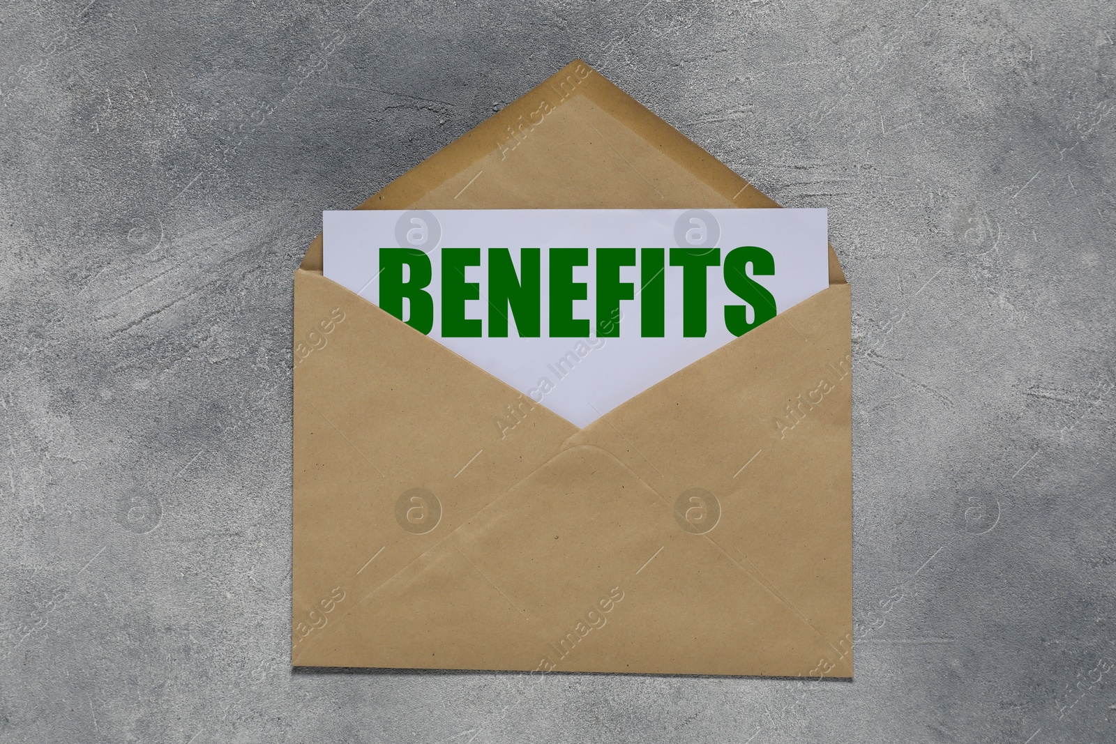 Image of Letter with Benefits word and envelope on grey table, top view