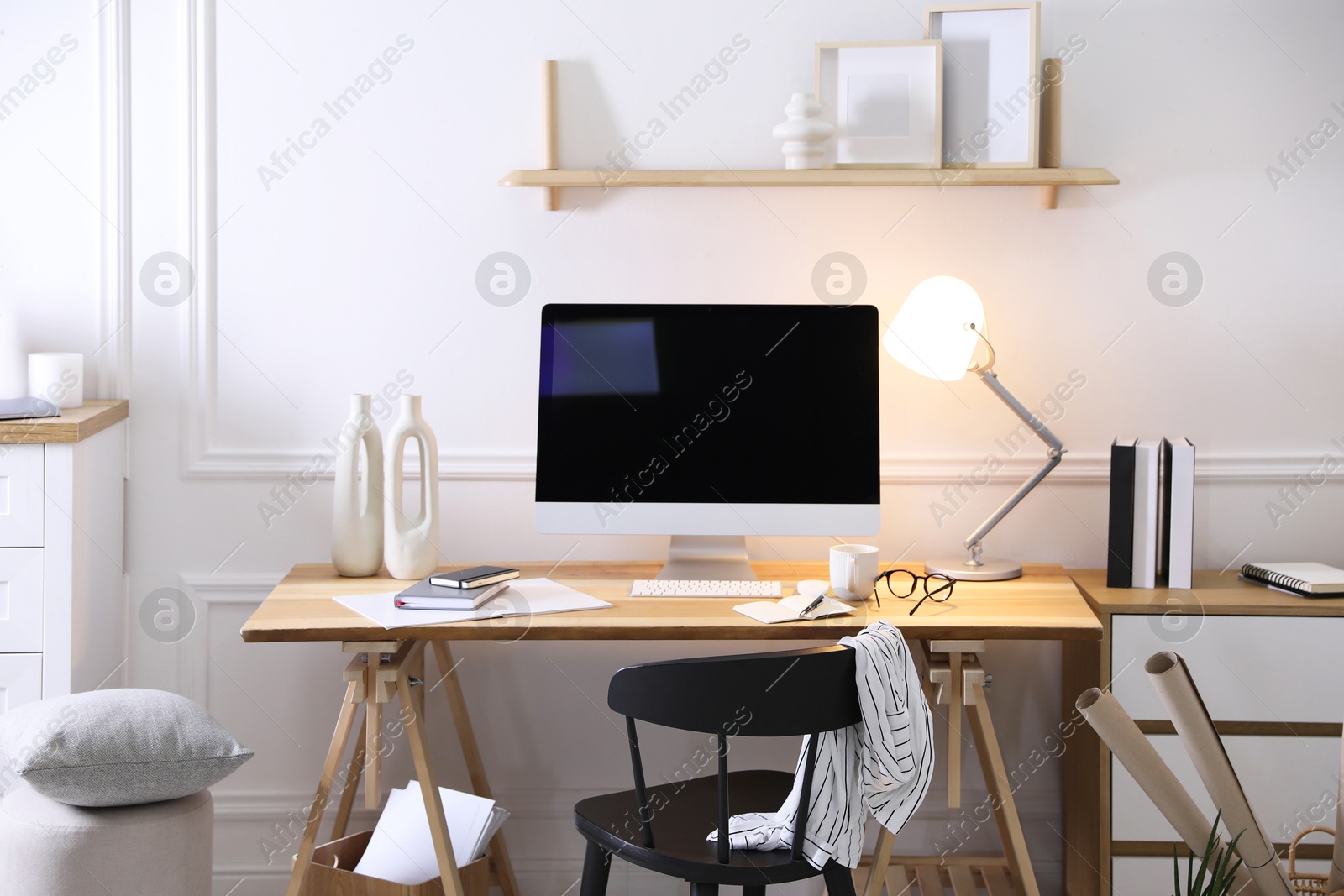 Photo of Comfortable workplace with computer in home office