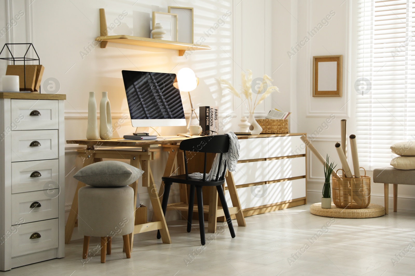 Photo of Comfortable workplace with computer in home office