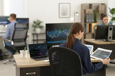 Photo of Stock exchange. Business team working in office, selective focus