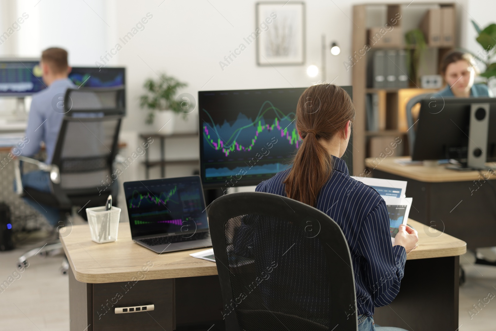 Photo of Stock exchange. Business team working in office, selective focus