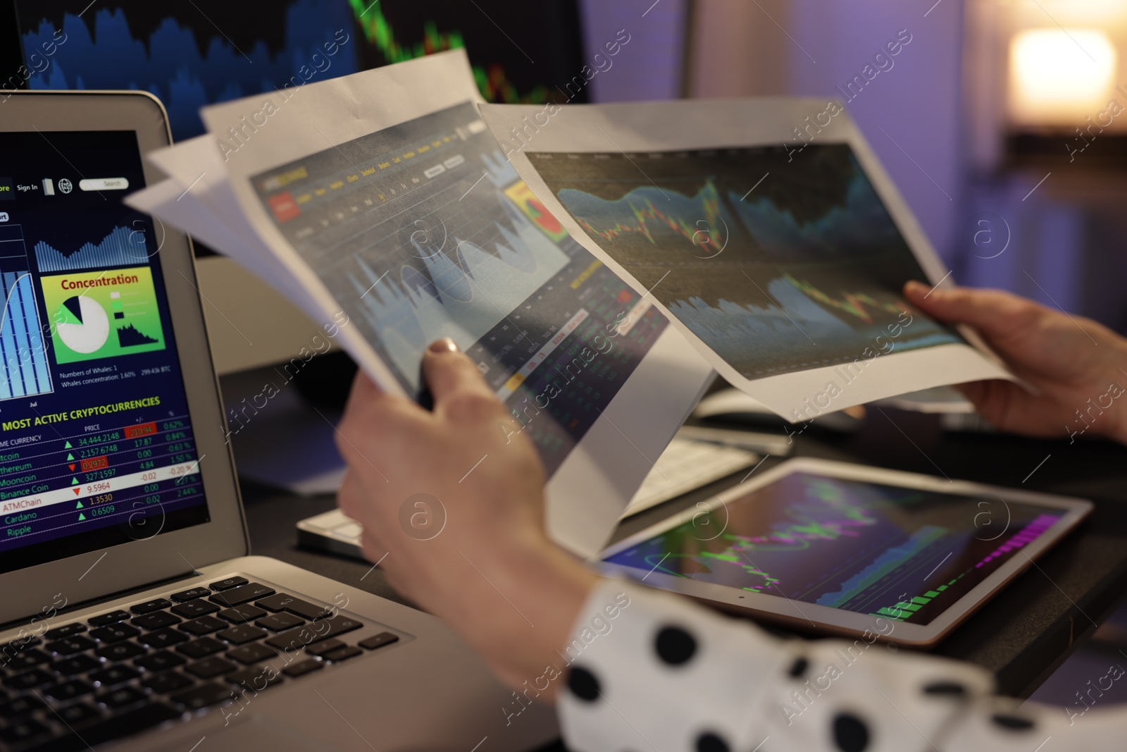 Photo of Stock exchange. Woman working in office at night, closeup