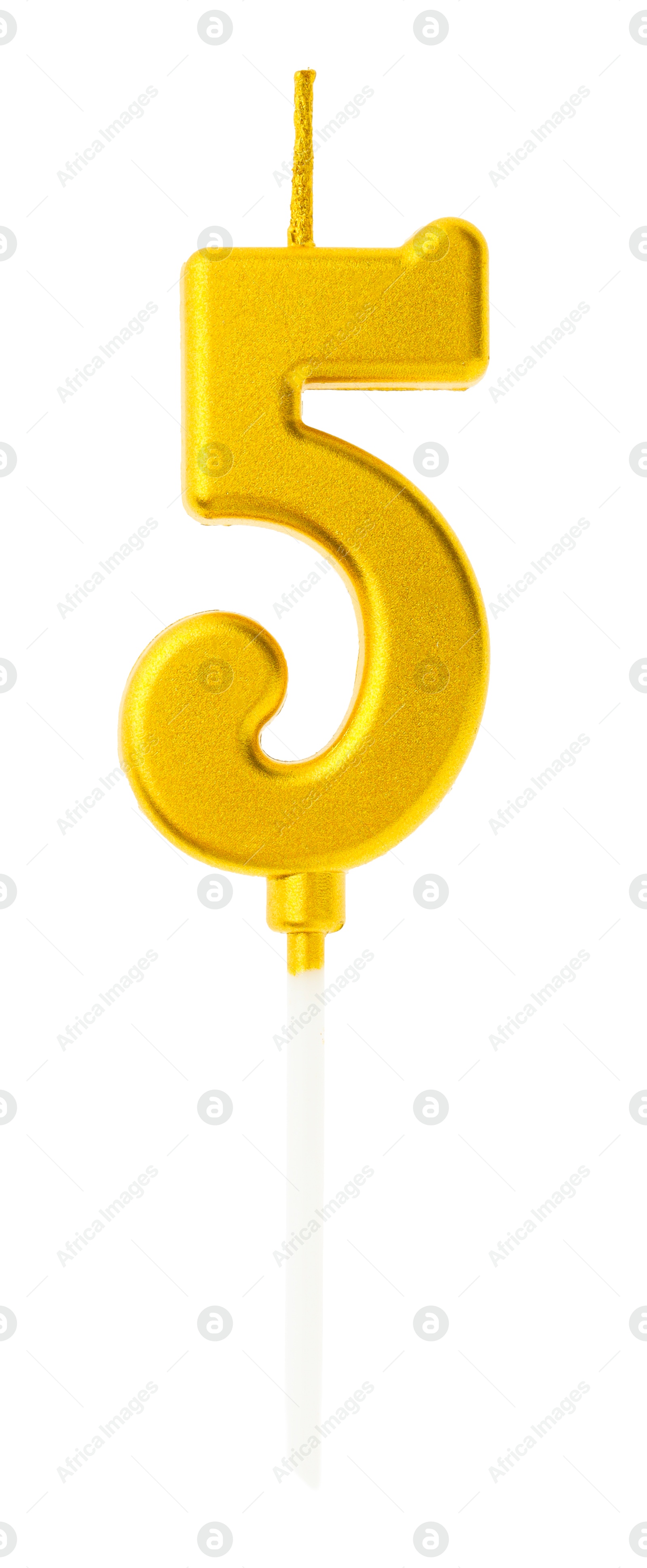 Photo of Golden birthday candle in shape of number 5 isolated on white