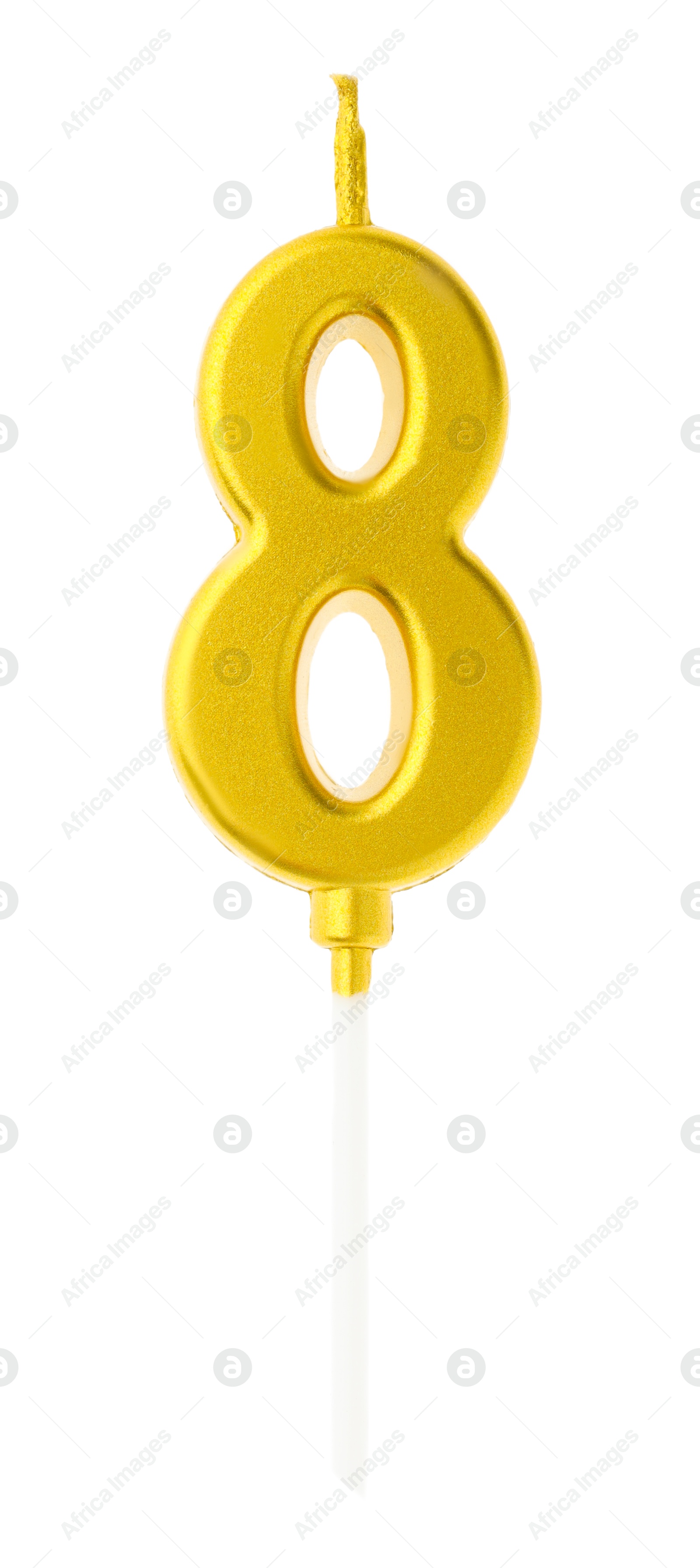 Photo of Golden birthday candle in shape of number 8 isolated on white