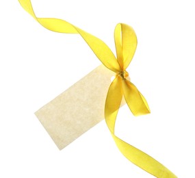 Photo of Blank tag with ribbon bow isolated on white