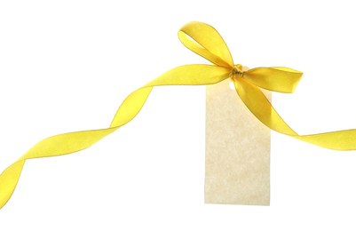 Photo of Blank tag with ribbon bow isolated on white