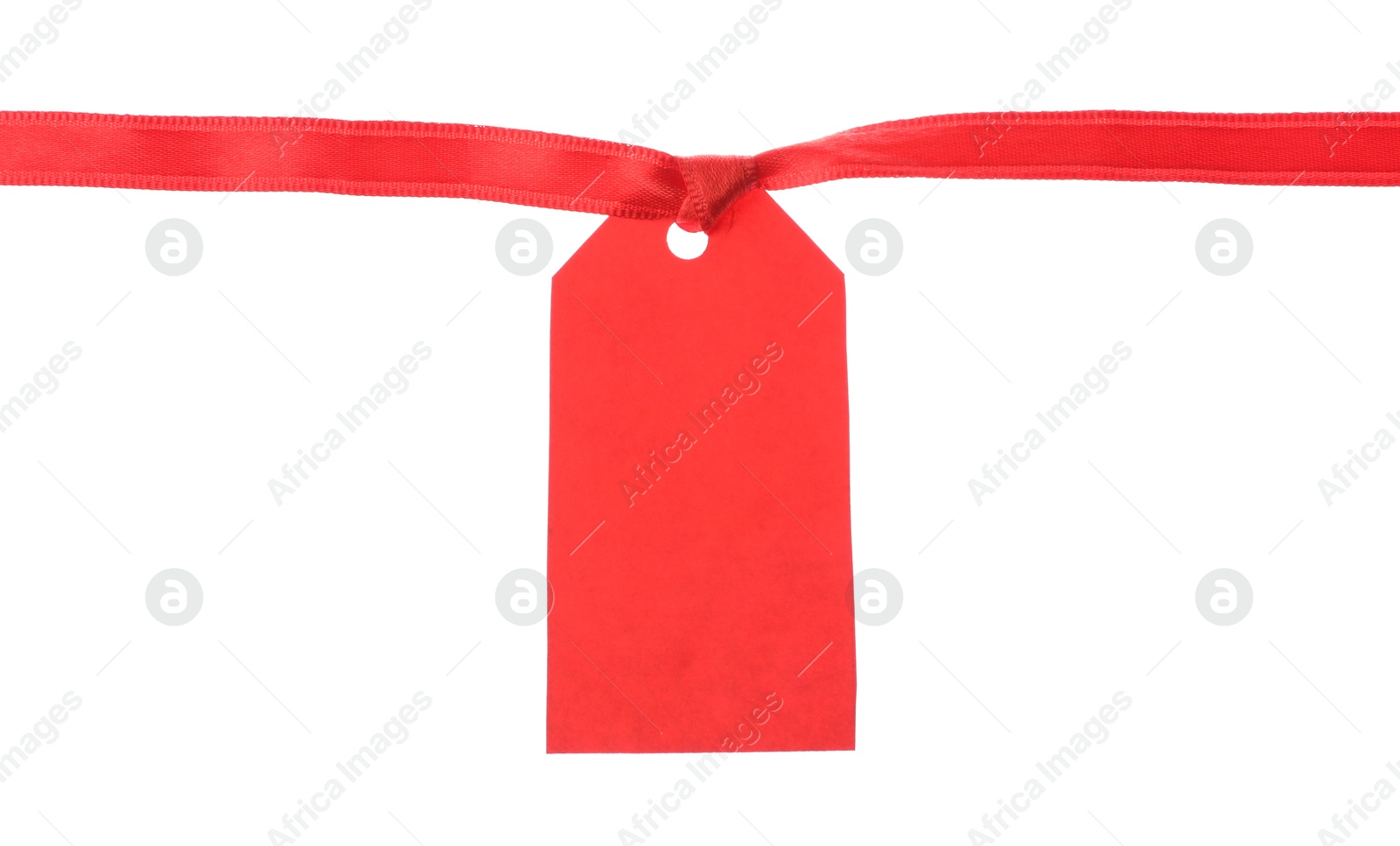 Blank tag with ribbon isolated on white Photo of Blank tag with ribbon isolated on white