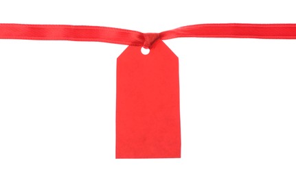 Photo of Blank tag with ribbon isolated on white