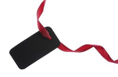 Photo of Blank tag with ribbon isolated on white
