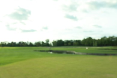 Photo of Blurred view of golf course on sunny day