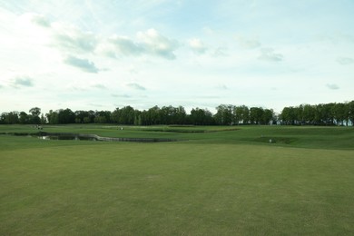 Photo of Beautiful view of golf course on sunny day