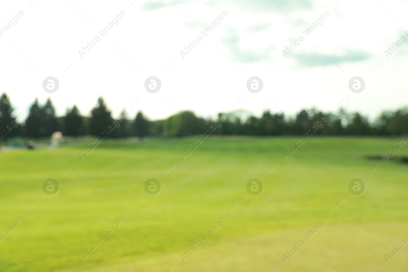 Photo of Blurred view of golf course on sunny day