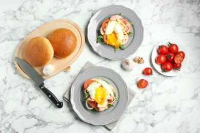 Photo of Flat lay composition with tasty brunch served on white marble table