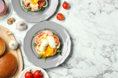 Photo of Flat lay composition with tasty brunch on white marble table. Space for text