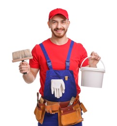 Professional painter with brush and bucket of paint on white background