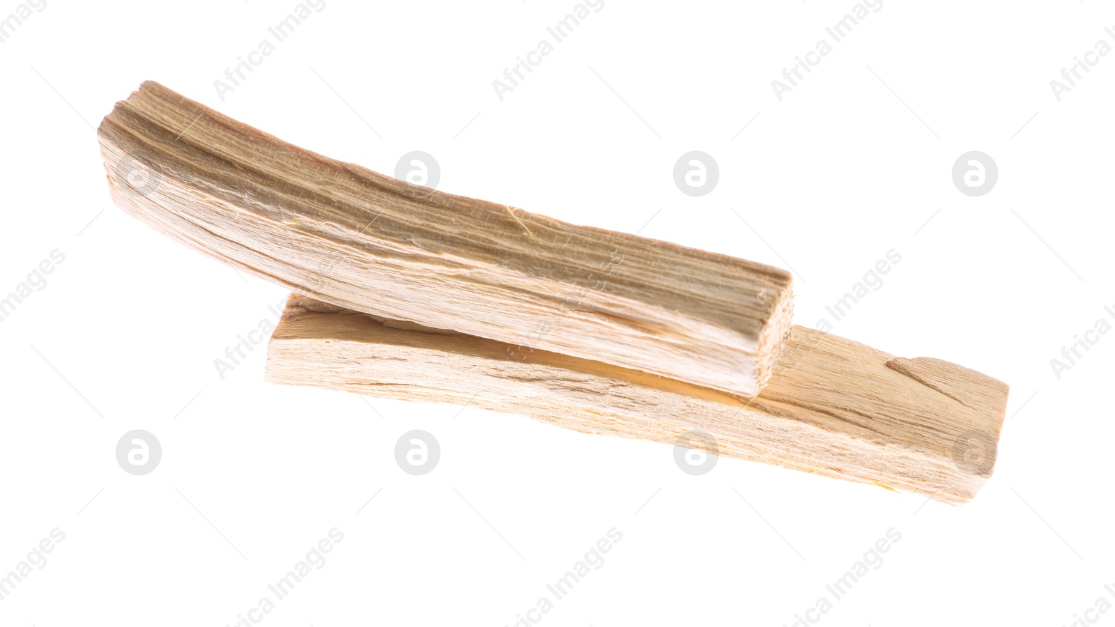 Photo of Two palo santo sticks on white background