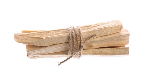 Photo of Bunch of palo santo sticks on white background