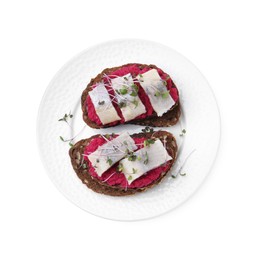 Photo of Tasty sandwich with herring and horseradish sauce on white background, top view