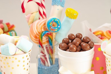 Candy bar. Different yummy sweets on table indoors, closeup