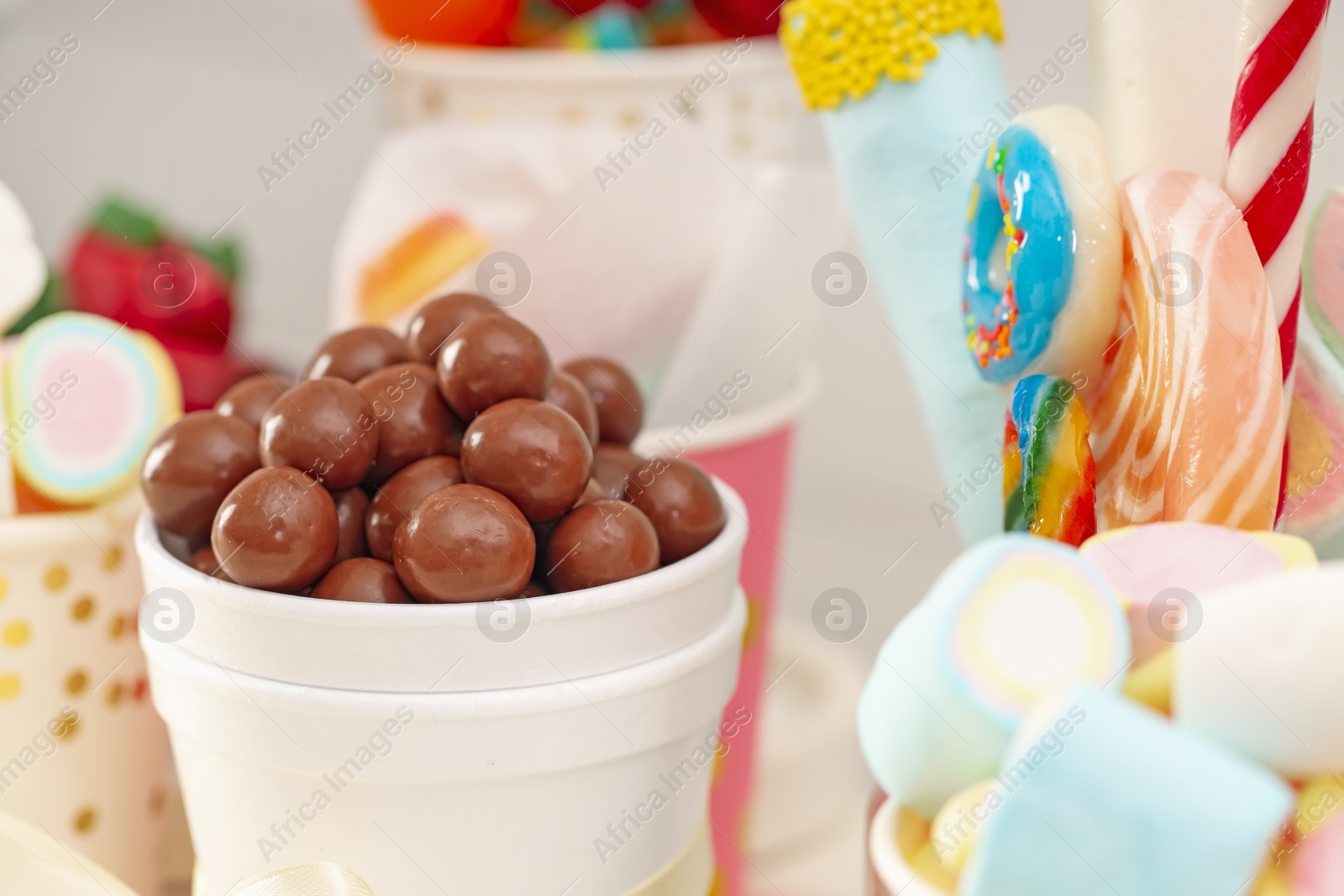 Photo of Candy bar. Different yummy sweets indoors, closeup