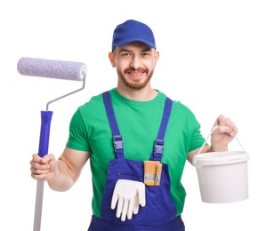 Professional painter with roller and bucket of paint on white background