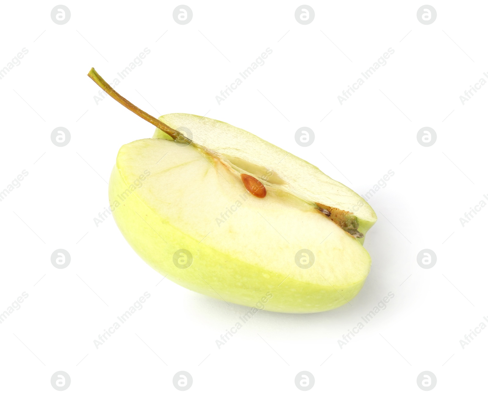 Half of ripe green apple isolated on white Photo of Half of ripe green apple isolated on white