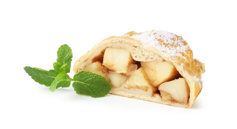 Photo of Piece of tasty apple strudel with powdered sugar and mint isolated on white