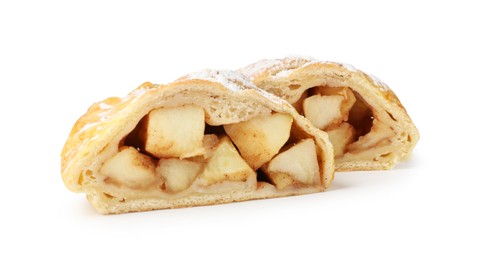 Photo of Pieces of tasty apple strudel with powdered sugar isolated on white