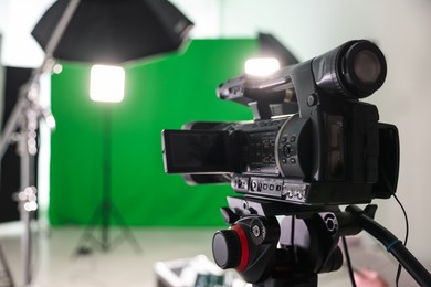 Camera and other professional equipment in modern film studio, closeup