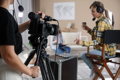 Group of people working in modern film studio, selective focus