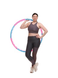 Photo of Plus size woman in gym clothes with hula hoop on white background