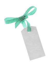Photo of Blank tag with green bow isolated on white