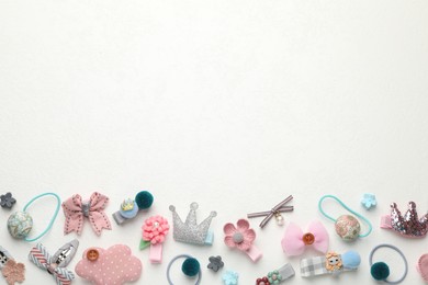 Photo of Different hair accessories on white table, flat lay. Space for text