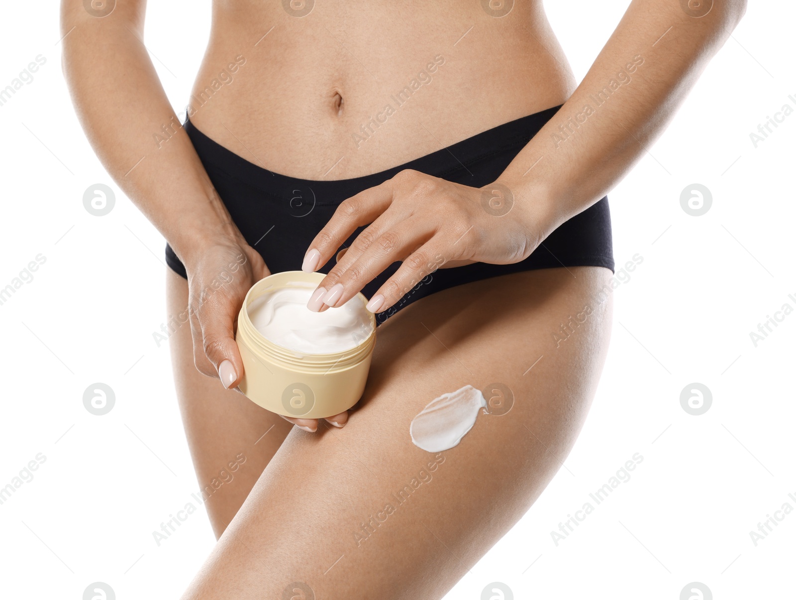 Photo of Woman applying anti cellulite cream on white background, closeup