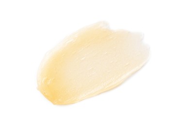 Sample of beige lip balm isolated on white, top view