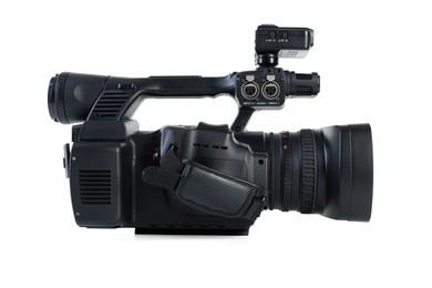 Photo of Modern professional video camera isolated on white