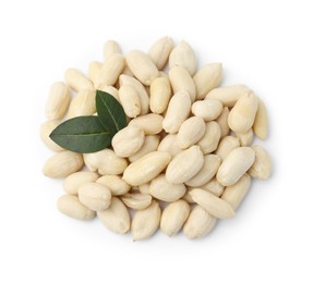 Photo of Pile of fresh peeled peanuts isolated on white, top view