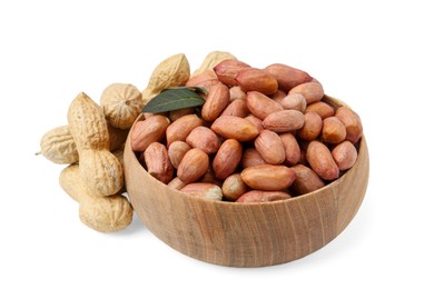 Photo of Fresh peanuts and bowl isolated on white