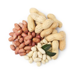 Photo of Pile of different peanuts and leaves isolated on white, top view