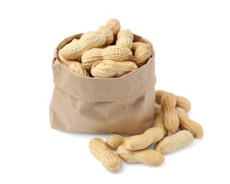 Photo of Unpeeled peanuts and paper bag isolated on white